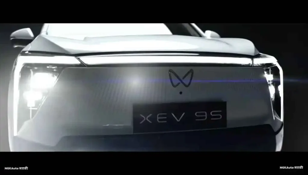 Mahindra XEV 9S electric SUV showing its bold front design with signature LED headlights and sharp grille, uncovered and highlighted