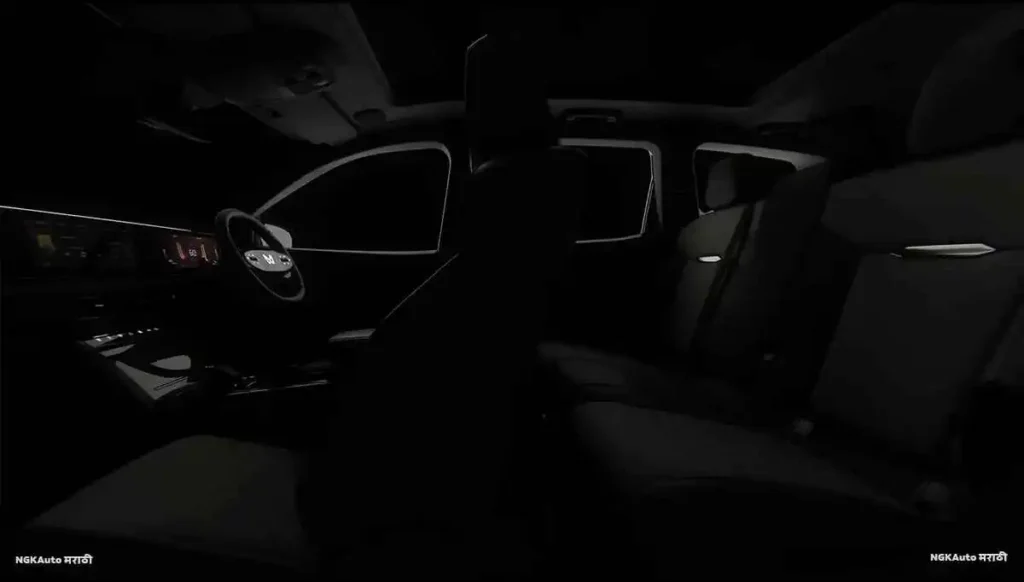 Interior view of Mahindra XEV 9S focusing on luxurious seats, spacious cabin layout, and premium material finishes